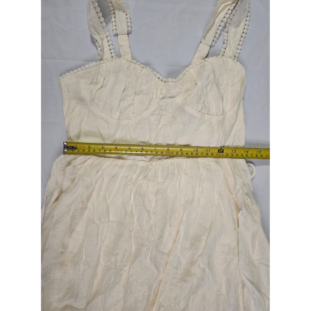 Forever 21 Vanilla Mini Dress Lace Up Back Pom Pom Trim Cream Size L NWT - Picture 10 of 16